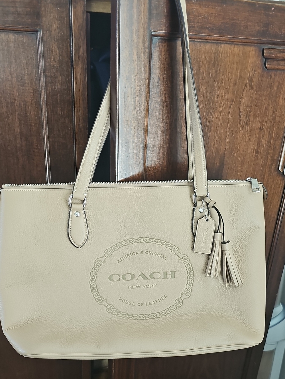 Coach Beige Leather Tote with Tassel Charm